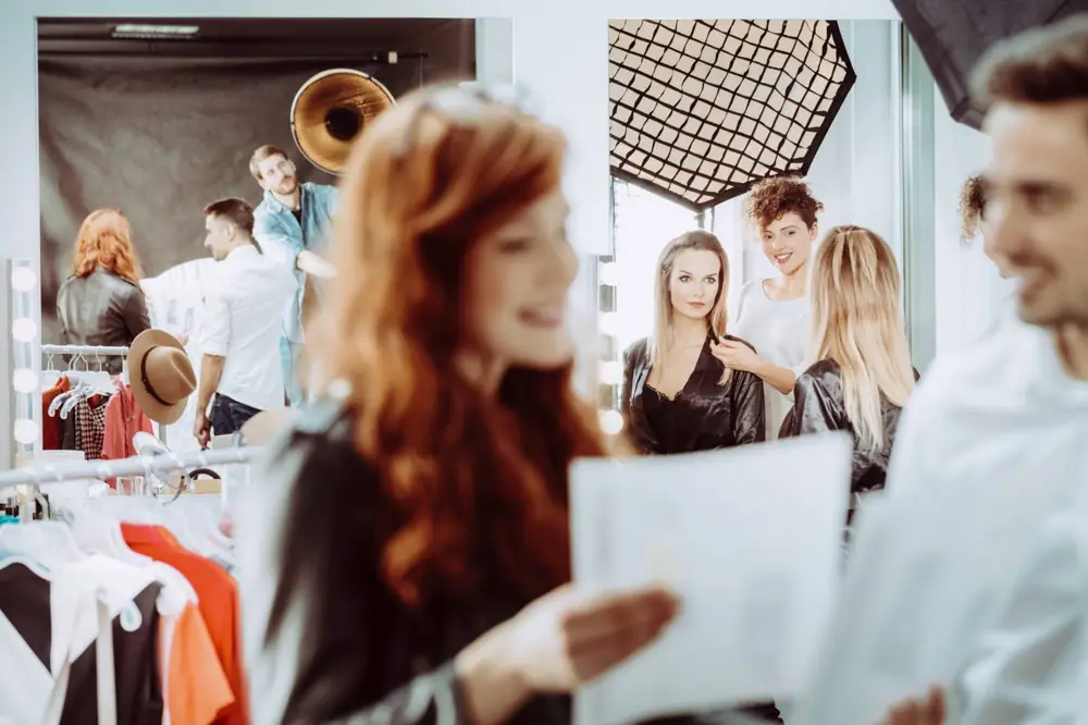 Models backstage at a fashion runway event by Up North Runway